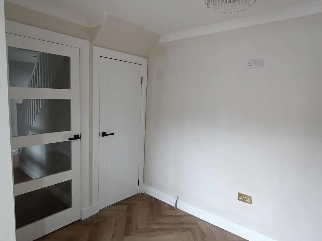 Adjoining room finished with internal doors, skirting and herringbone flooring